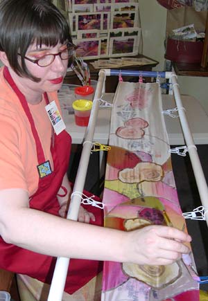 Renne painting a silk scarf